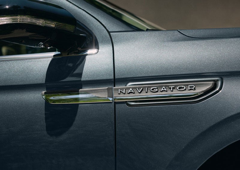 The nameplate badge near the passenger sideview mirror on 2023 Lincoln Navigator SUV shows off geometric design. | Gary Yeomans Lincoln Ocala in Ocala FL