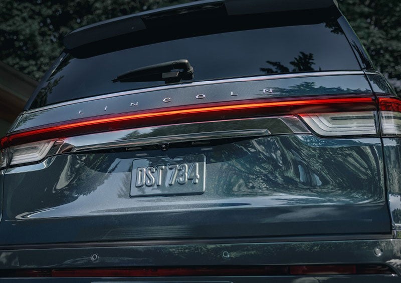 The wraparound rear lights of a Lincoln Navigator SUV are shown. | Gary Yeomans Lincoln Ocala in Ocala FL