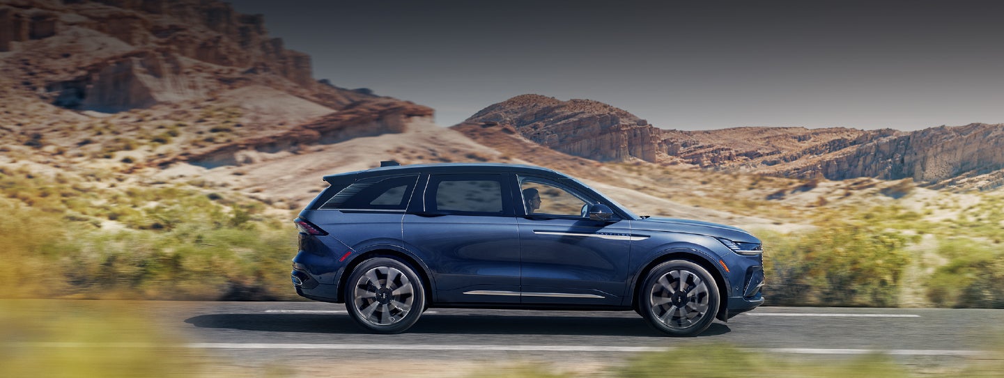 A 2024 Lincoln Nautilus® SUV is being driven in a desert setting. | Gary Yeomans Lincoln Ocala in Ocala FL