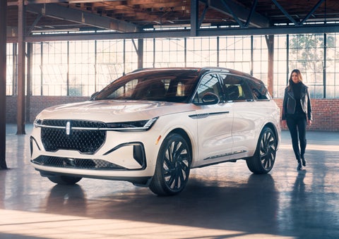A person approaches a 2024 Lincoln Nautilus® SUV. | Gary Yeomans Lincoln Ocala in Ocala FL
