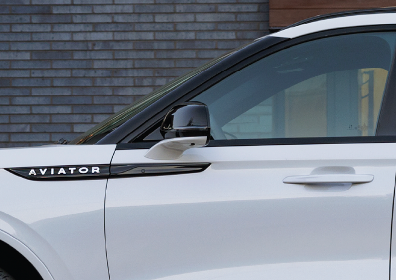 The driver’s door of a white 2025 Lincoln Aviator® SUV is showcased. | Gary Yeomans Lincoln Ocala in Ocala FL