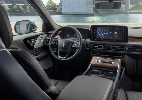 The interior of the 2025 Lincoln Aviator® SUV is shown parked with a view of a harbor through the windshield. | Gary Yeomans Lincoln Ocala in Ocala FL