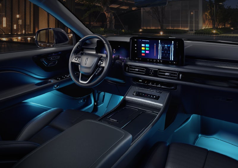 Deep blue ambient lighting glows from various places within a 2026 Lincoln Aviator® SUV. | Gary Yeomans Lincoln Ocala in Ocala FL