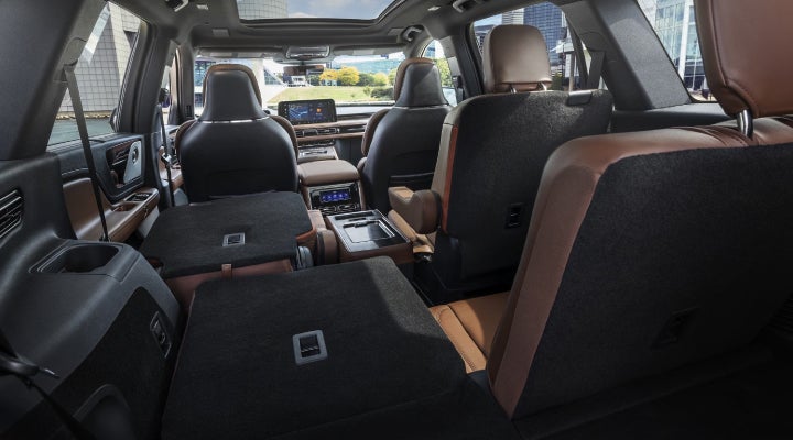 One side of the PowerFold® third-row seat and a second-row seat are folded forward in the 2026 Lincoln Aviator® SUV. | Gary Yeomans Lincoln Ocala in Ocala FL