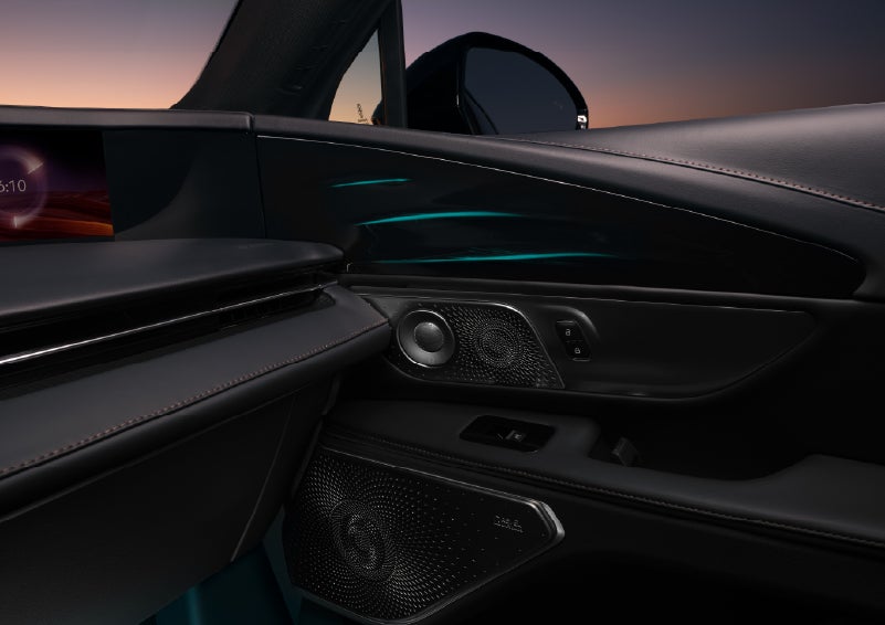 Selectable ambient lighting glows in the passenger door panel. | Gary Yeomans Lincoln Ocala in Ocala FL