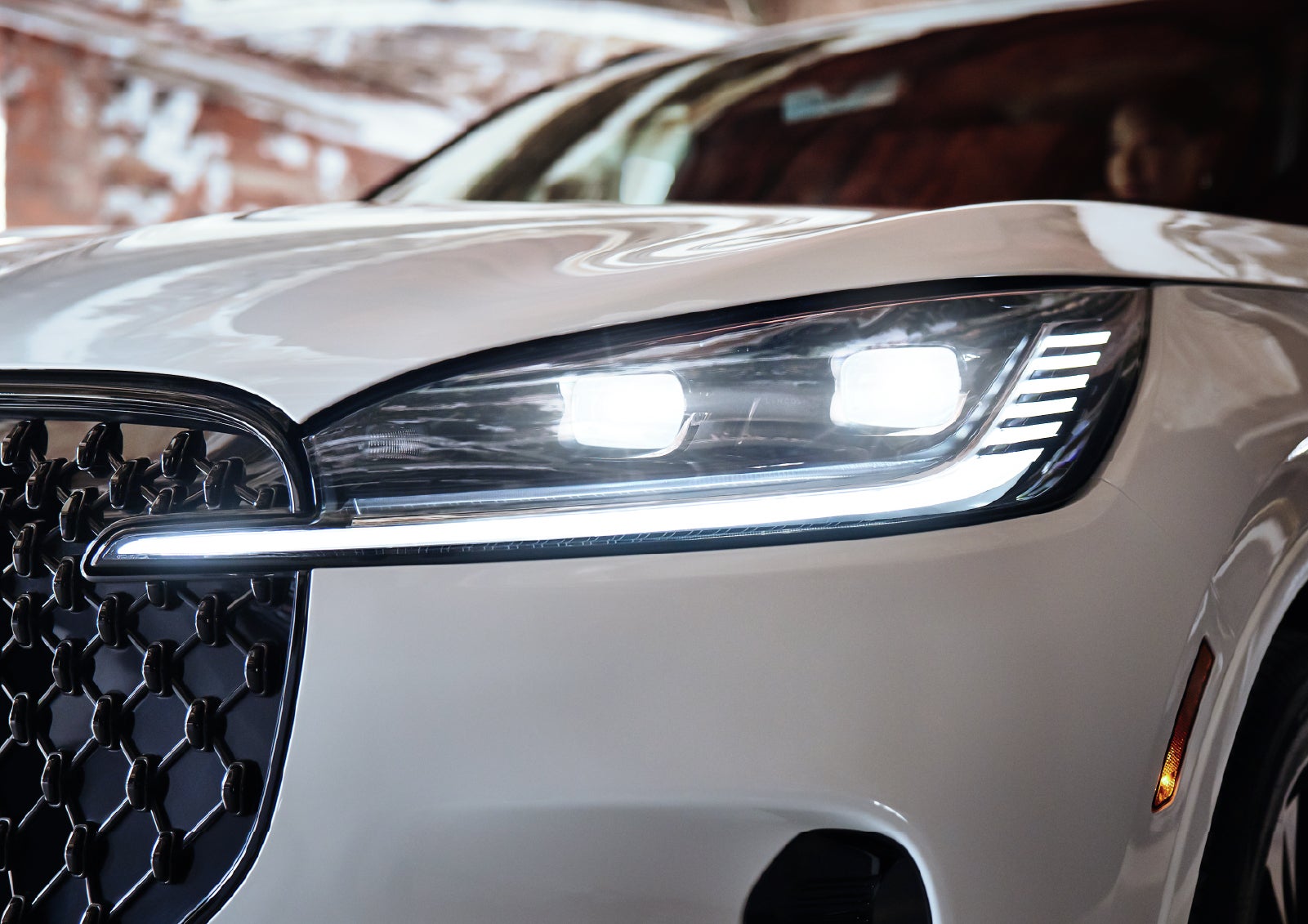 A close-up of a headlamp on the 2027 Lincoln Aviator® SUV is shown. | Gary Yeomans Lincoln Ocala in Ocala FL