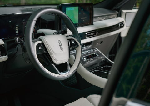 The leather-trimmed steering wheel of a 2027 Lincoln Aviator® Black Label™ SUV. | Gary Yeomans Lincoln Ocala in Ocala FL